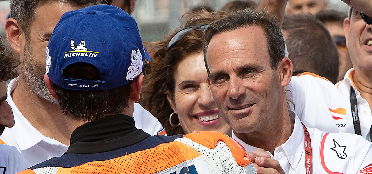 Alberto Puig con Marc Márquez